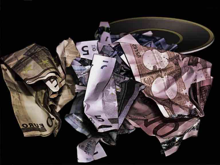 crumpled euro cash notes