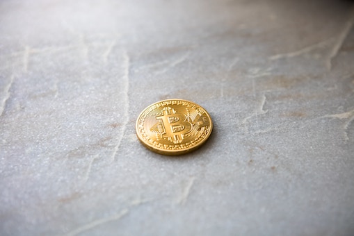 cryptocurrency coin on table