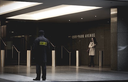 security guard in foyer of building