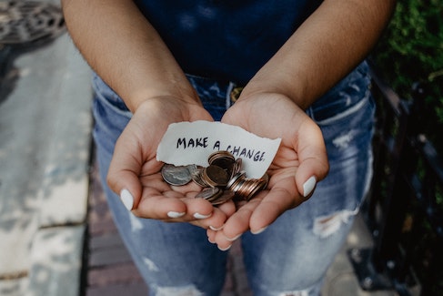 spare change in cupped hands